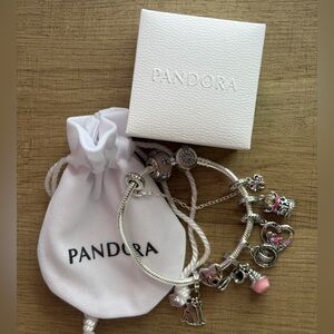 Authentic Pandora bracelet+2 Pandora charms+ assorted sterling silver charms.